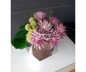 Up Todate Floral Design In Hexagon Vase